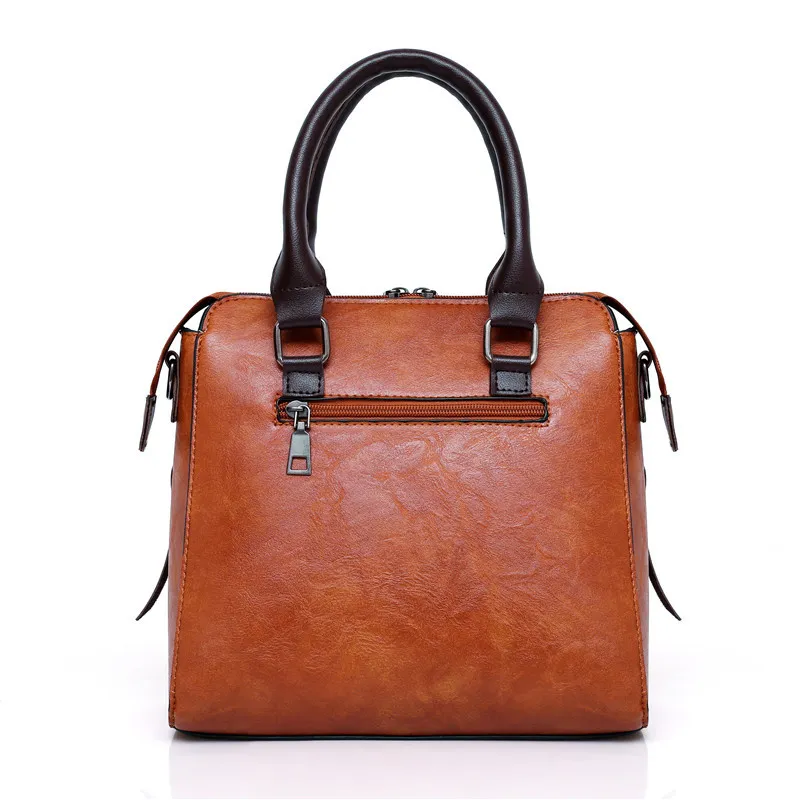 Kit Premium em Couro Genuino - Bolsa + Carteira + Carteira de Mão + Necessaire de Brinde - Image 3