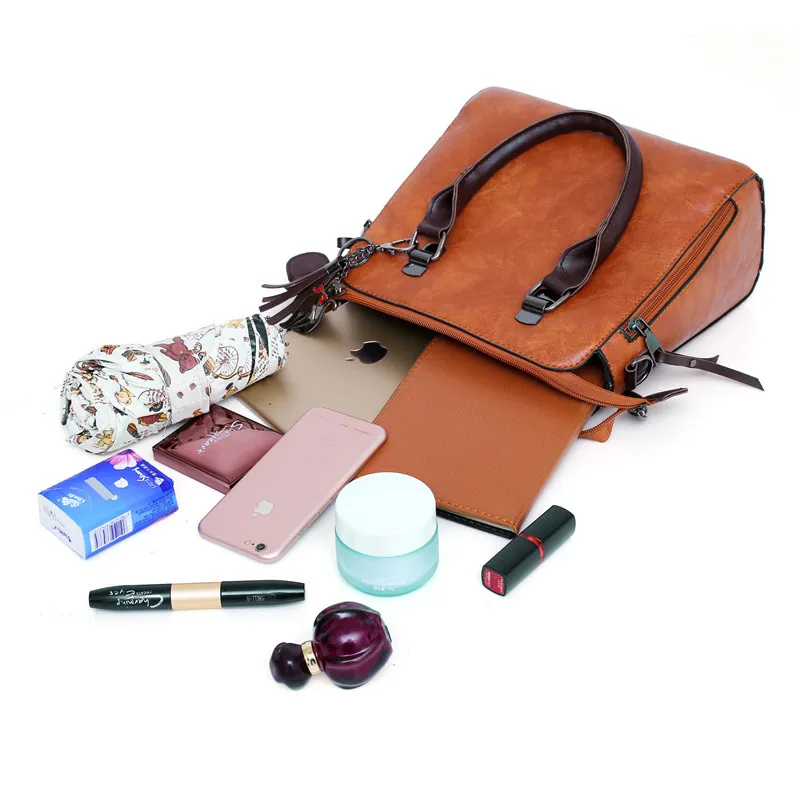 Kit Premium em Couro Genuino - Bolsa + Carteira + Carteira de Mão + Necessaire de Brinde - Image 5